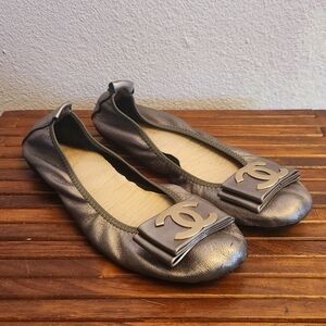 CHANEL Silver Ballet Flats with Logo Accent